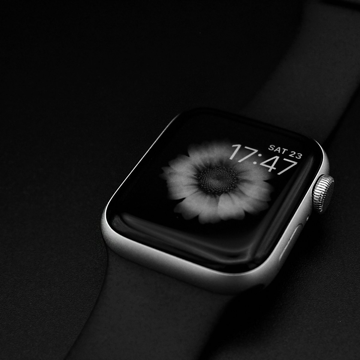 a black and white photo of an apple watch